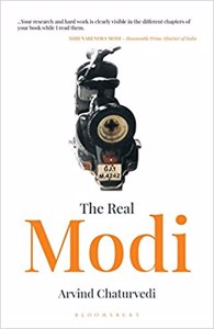 Cover page of the book 'THHE REAL MODI'