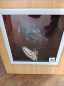 Cover page of the book 'ARCHIES PHOTOFRAME BLACK DOG WITH BLACK COAT'