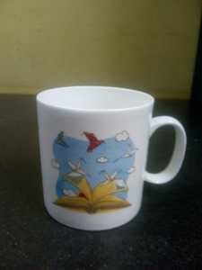 Cover page of the book 'STARMARK 25 MINDFUL YEARS MUG (BOOK WITH FLYING BIRDS)'